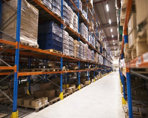 interior-large-distribution-warehouse-with-shelves-stacked-with-palettes-goods-ready-market interior-large-distribution-warehouse-with-shelves-stacked-with-palettes-goods-ready-market